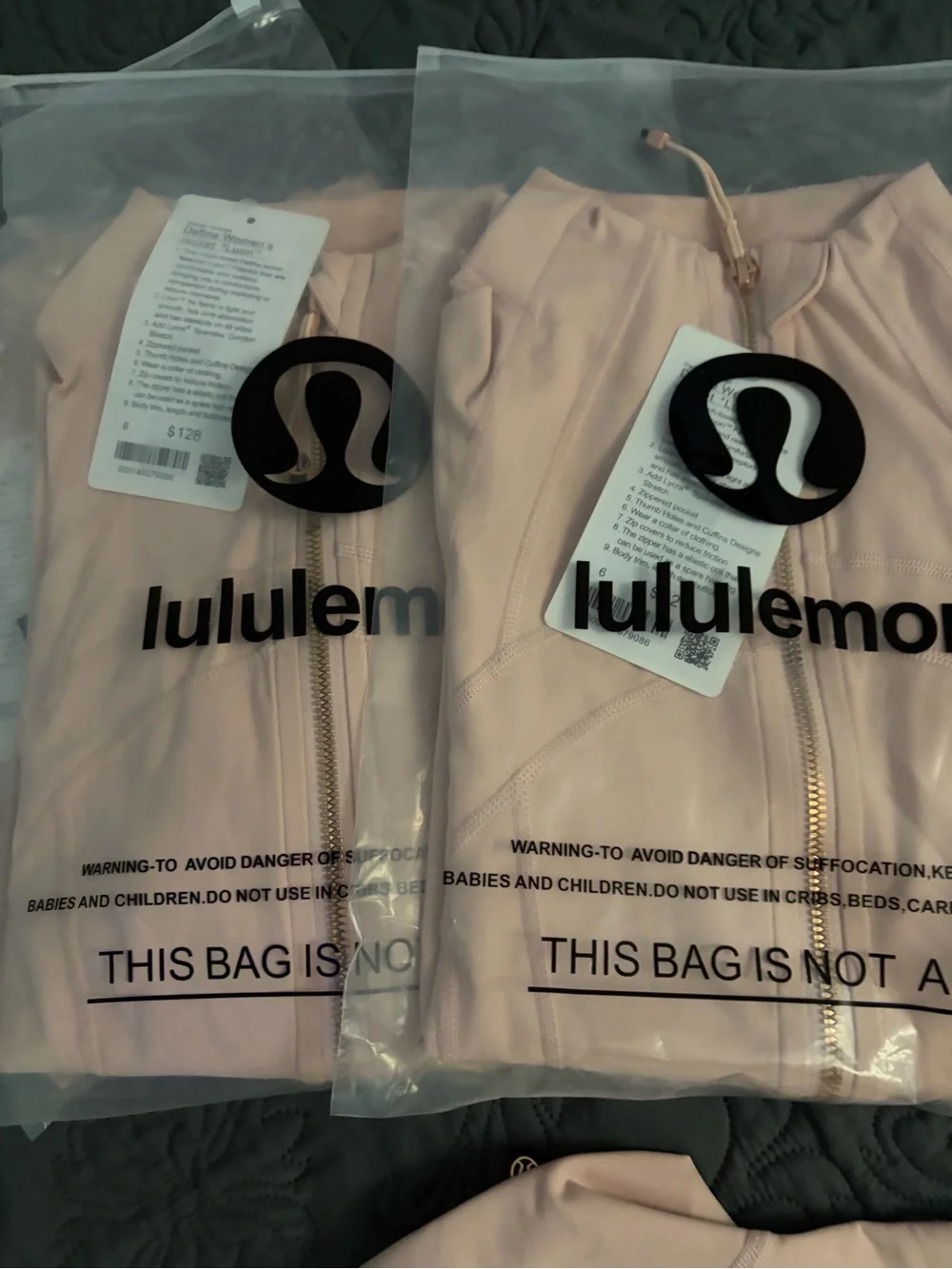Pink Lululemon Define Jacket with Gold zipper and gold pocket zipper